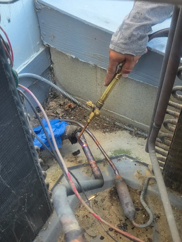 Damaged wiring found inside an HVAC unit