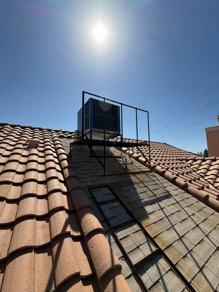 Rooftop HVAC unit installed on a tile roof