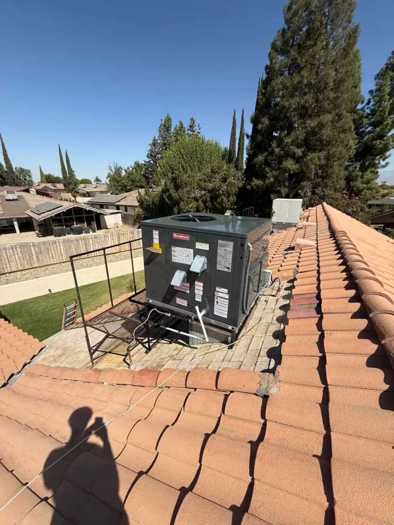 Rooftop package HVAC unit on a tile roof